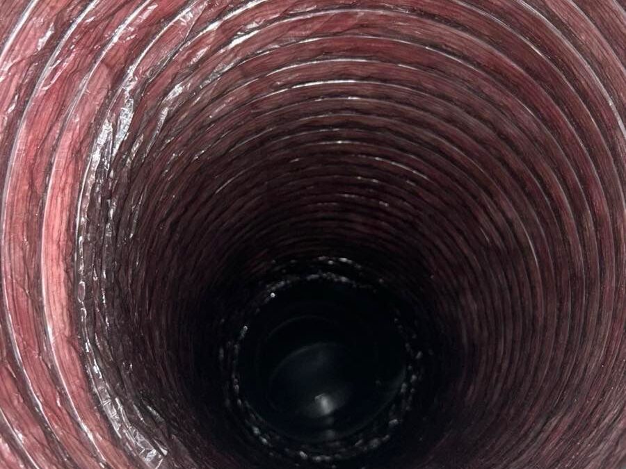 How Dryer Vent Length and Bends Affect Lint Buildup